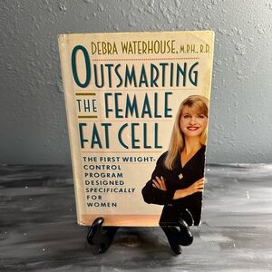 Outsmarting the female fat cell paperback Debra Waterhouse MPH.,RD 1993